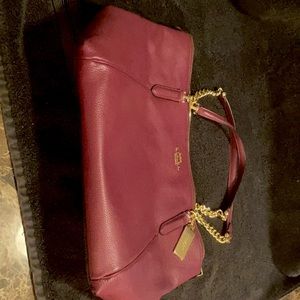 Brand new. Never used Coach purse